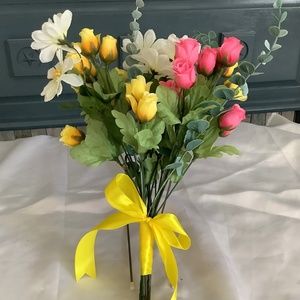 Pink and yellow rosebud with daisies and eucalyptus bridal bouquet